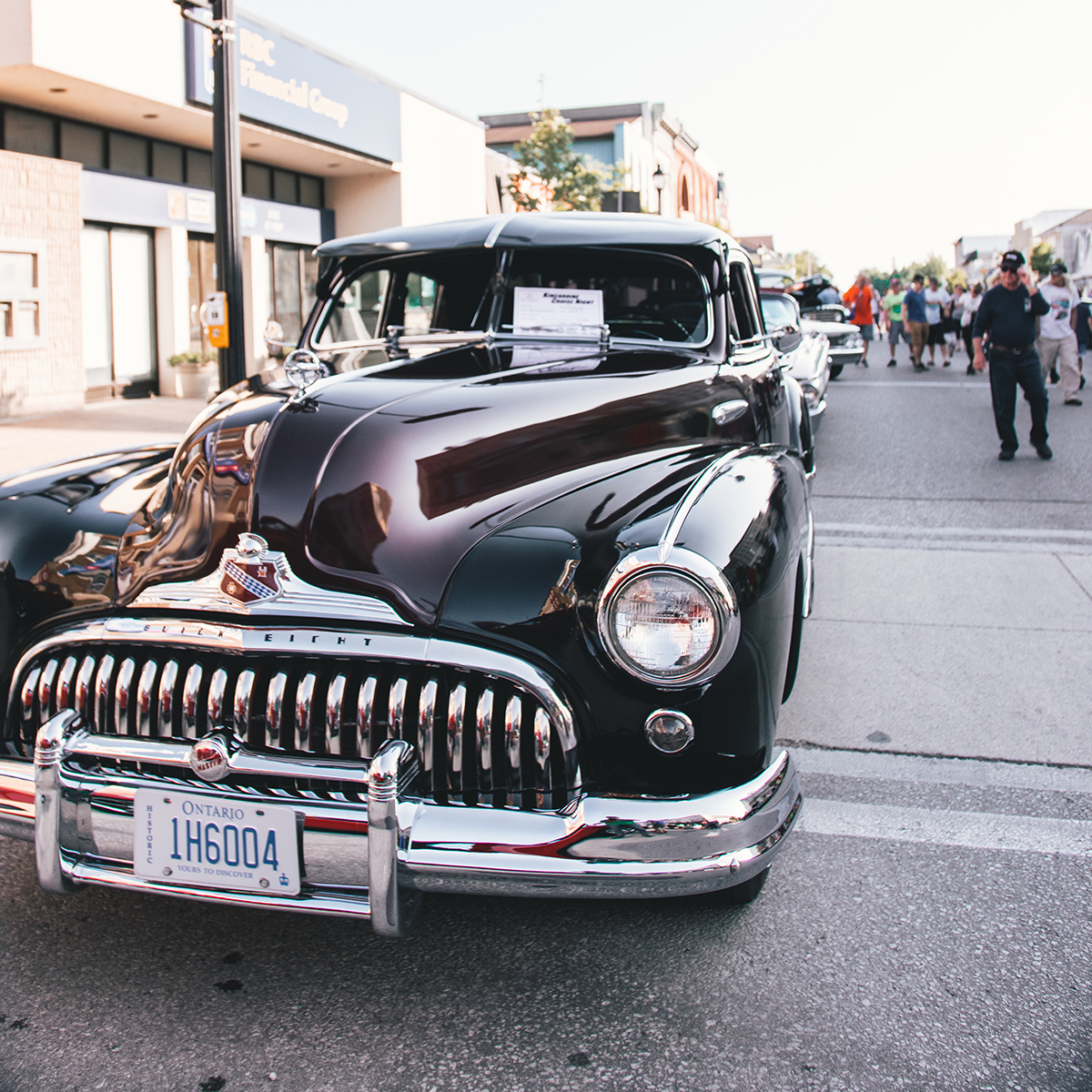 A classic black car on display at Cruise Night.