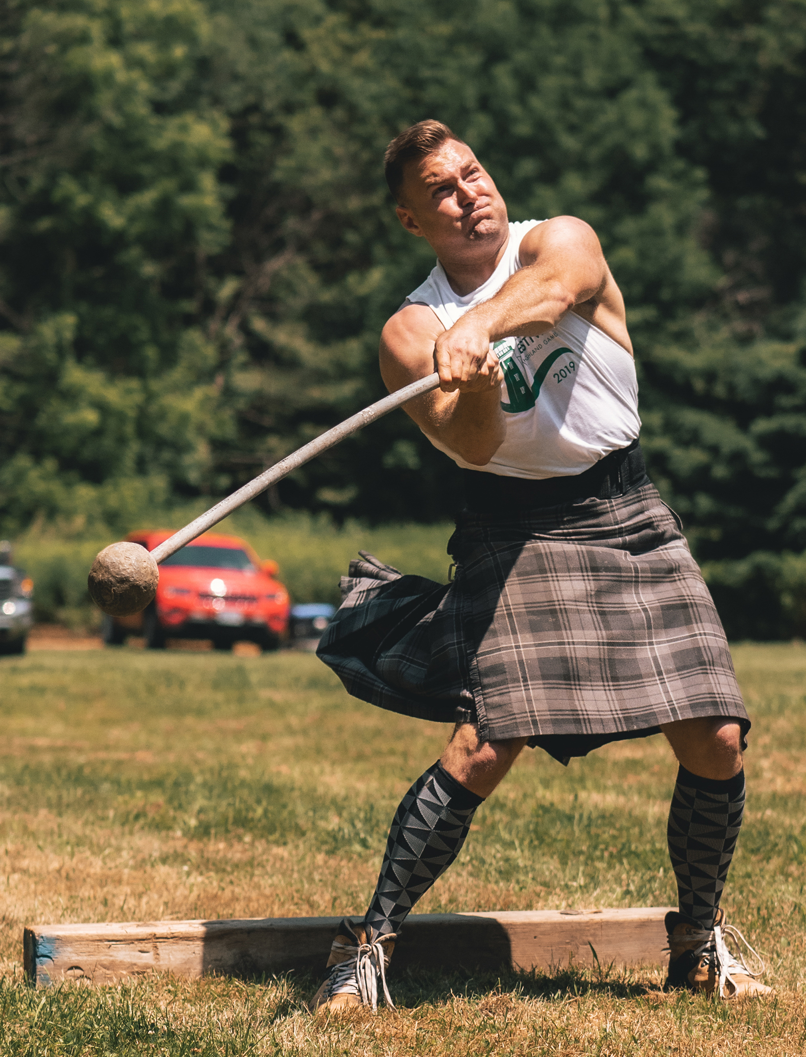 An athlete competes at the Kincardine Scottish Festival and Highland Games.